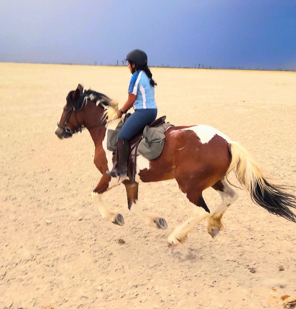 Galloping across the Makgadikgadi Pans on an African horse riding vacation